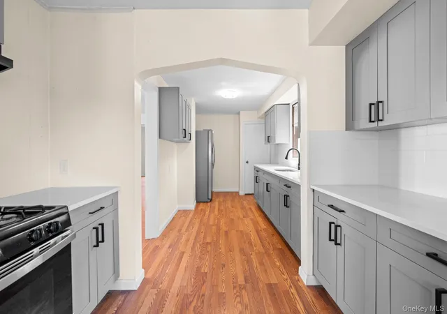 Photo 3 of Single family home for sale at 1 Lewis Pl, Hempstead, NY 11563 | MLS# 1052811 | Listing updated on 2026-10-05