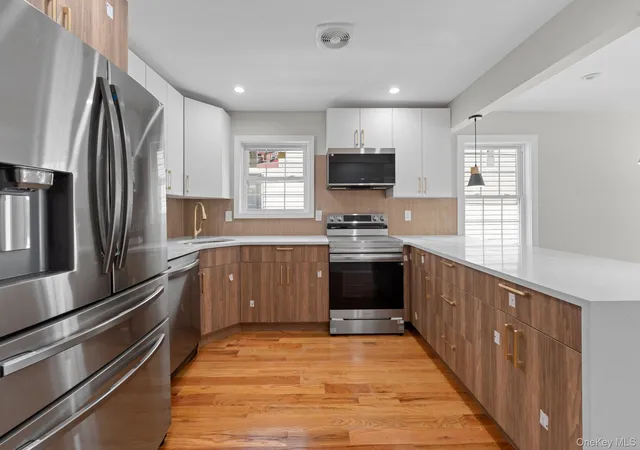 Photo 2 of Multi family home for sale at 21950 143rd Avenue, New York, NY 11413 | MLS# 1052840 | Listing updated on 2026-09-20