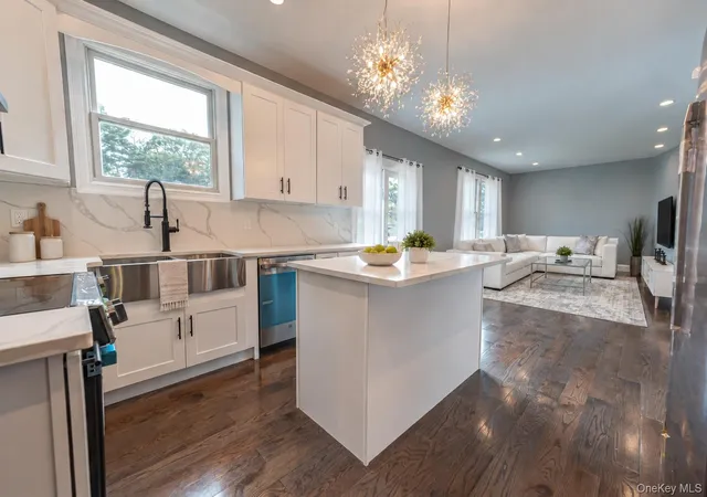 Photo 4 of Single family home for sale at 71 Stuyvesant Ave, Brookhaven, NY 11950 | MLS# 1052859 | Listing updated on 2026-10-08