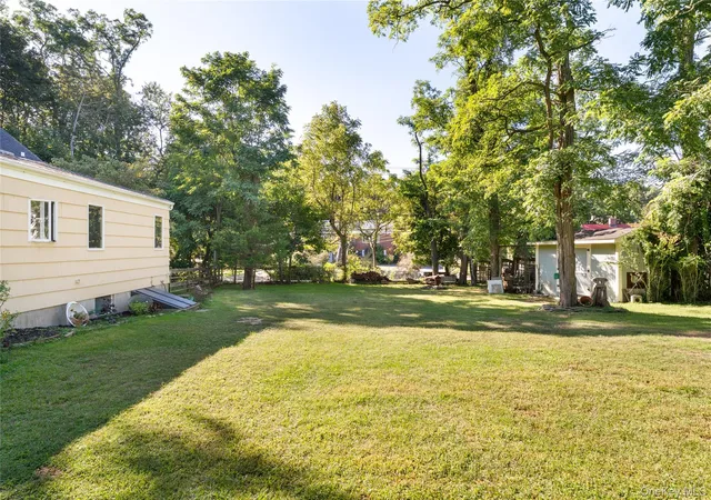 Photo 3 of Single family home for sale at 4 Acacia Rd, Brookhaven, NY 11778 | MLS# 1052935 | Listing updated on 2026-09-20