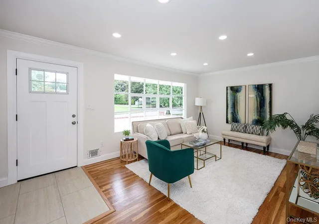 Photo 3 of Single family home for sale at 21 Dewey Rd, Smithtown, NY 11725 | MLS# 1053188 | Listing updated on 2026-09-30