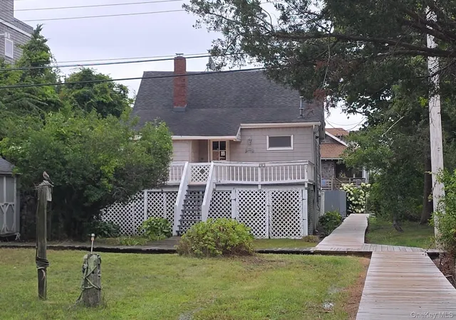 Photo 2 of Single family home for sale at 54 Oak Beach Rd, Babylon, NY 11702 | MLS# 1053217 | Listing updated on 2026-09-24