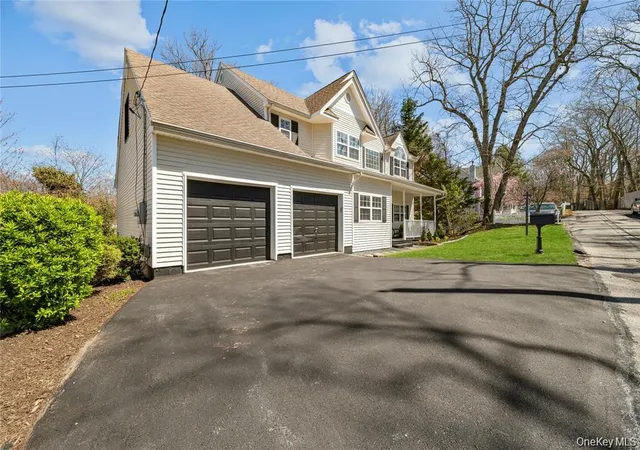 Photo 2 of Single family home for sale at 33 Potter Ln, Huntington, NY 11743 | MLS# 1053413 | Listing updated on 2026-10-08