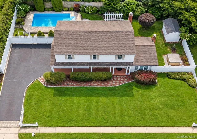 Photo 1 of Single family home for sale at 14 Osage Dr, Huntington, NY 11746 | MLS# 1053481 | Listing updated on 2026-10-01