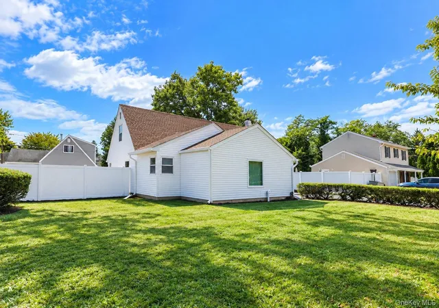 Photo 2 of Single family home for sale at 14 Arcadia Dr, Huntington, NY 11746 | MLS# 1053605 | Listing updated on 2026-10-04