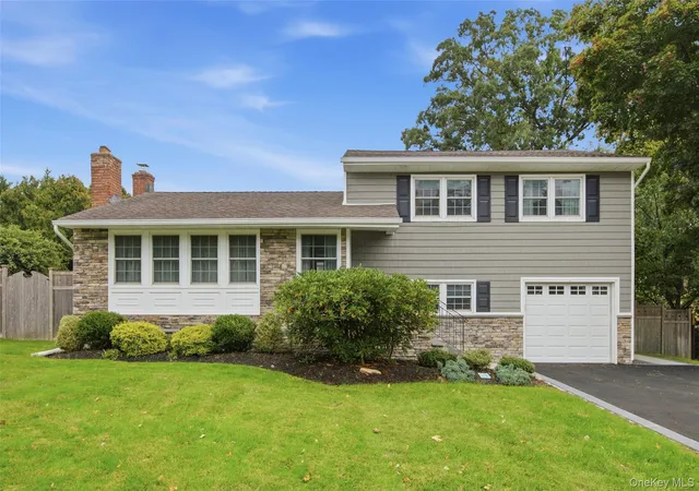 Photo 1 of Single family home for sale at 23 Apple Tree Dr, Smithtown, NY 11788 | MLS# 1053726 | Listing updated on 2026-09-29