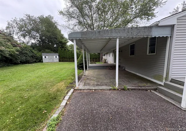 Photo 3 of Single family home for sale at 9 Harrison Ave, Brookhaven, NY 11733 | MLS# 1053770 | Listing updated on 2026-09-27