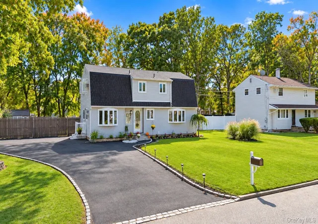 Photo 1 of Single family home for sale at 14 Hollingwood Dr, Brookhaven, NY 11727 | MLS# 1053828 | Listing updated on 2026-10-07