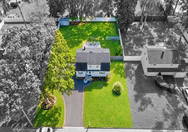Photo 3 of Single family home for sale at 14 Hollingwood Dr, Brookhaven, NY 11727 | MLS# 1053828 | Listing updated on 2026-10-07