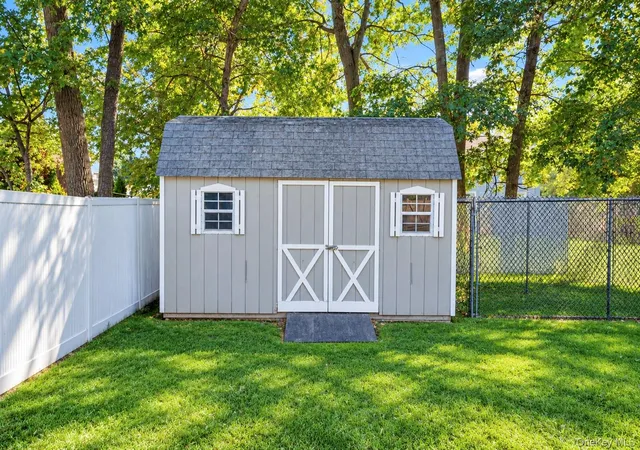 Photo 50 of Single family home for sale at 14 Hollingwood Dr, Brookhaven, NY 11727 | MLS# 1053828 | Listing updated on 2026-10-07