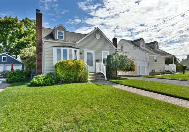 Photo 2 of Single family home for sale at 413 Stewart Ave, Hempstead, NY 11710 | MLS# 1053873 | Listing updated on 2026-10-28