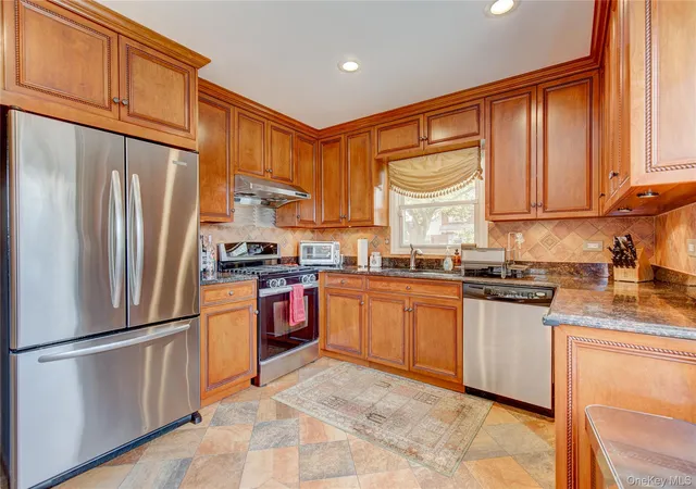 Photo 3 of Single family home for sale at 5703 Cloverdale Blvd, New York, NY 11364 | MLS# 1053948 | Listing updated on 2026-10-06