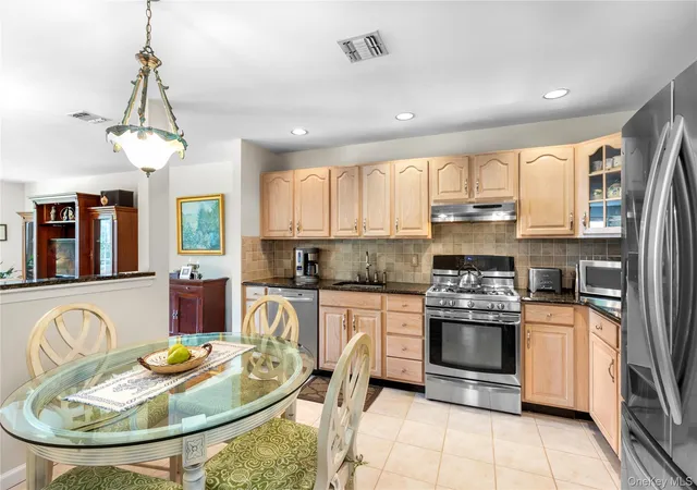 Photo 4 of Condo for sale at 317 Erik Dr, Brookhaven, NY 11733 | MLS# 1054265 | Listing updated on 2026-10-04