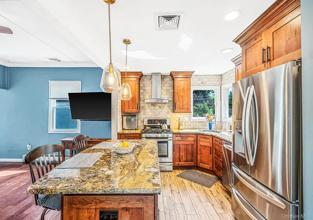 Photo 2 of Single family home for sale at 39 Plandome Rd, Brookhaven, NY 11789 | MLS# 1054347 | Listing updated on 2026-09-28