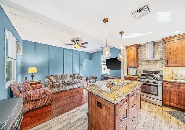 Photo 4 of Single family home for sale at 39 Plandome Rd, Brookhaven, NY 11789 | MLS# 1054347 | Listing updated on 2026-09-28