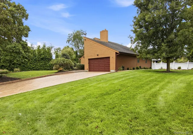 Photo 3 of Single family home for sale at 16 Bridle Path Ln, Brookhaven, NY 11777 | MLS# 1054498 | Listing updated on 2026-10-04