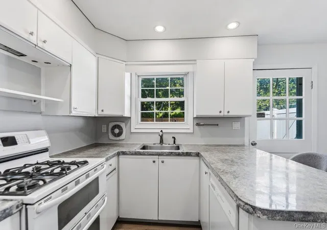 Photo 4 of Single family home for sale at 22 Half Moon Pond Rd, Brookhaven, NY 11961 | MLS# 1054679 | Listing updated on 2026-09-26