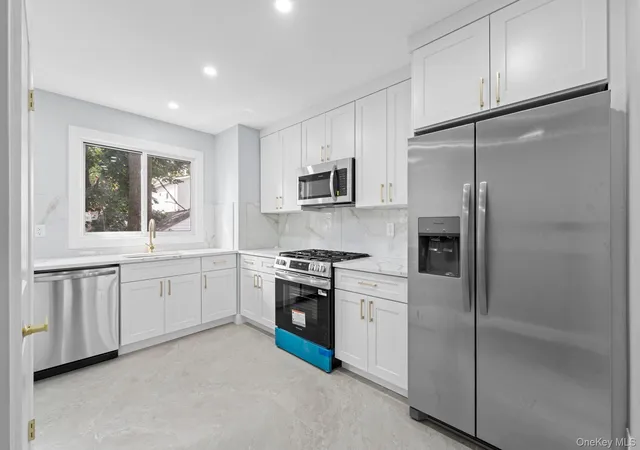 Photo 2 of Single family home for sale at 10928 143rd Street, New York, NY 11435 | MLS# 1054732 | Listing updated on 2026-09-24