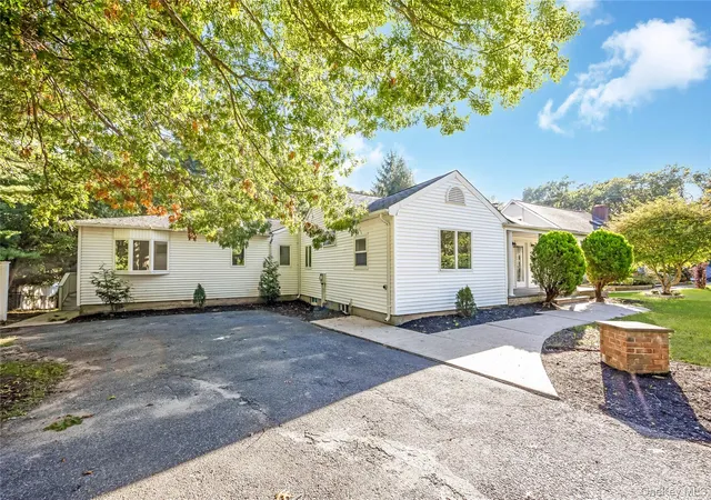 Photo 2 of Single family home for sale at 52 Rexmere Ave, Brookhaven, NY 11738 | MLS# 1054892 | Listing updated on 2026-10-29