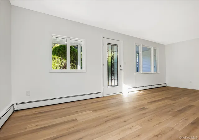 Photo 3 of Single family home for sale at 52 Rexmere Ave, Brookhaven, NY 11738 | MLS# 1054892 | Listing updated on 2026-10-29