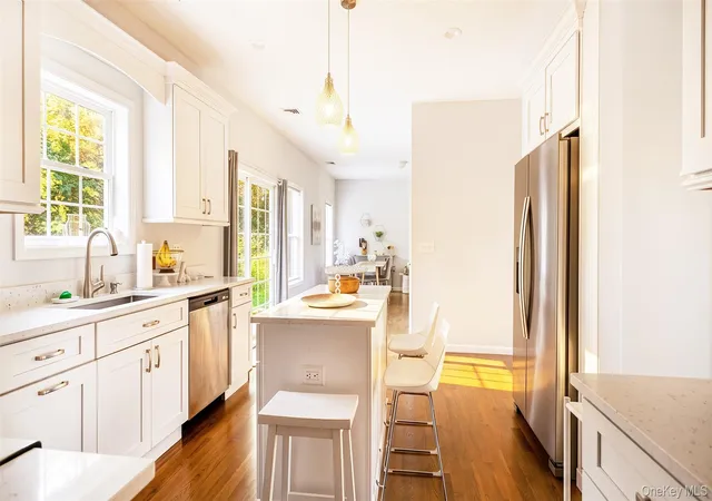 Photo 3 of Single family home for sale at 24 Belmont Rd, Brookhaven, NY 11789 | MLS# 1054924 | Listing updated on 2026-10-06