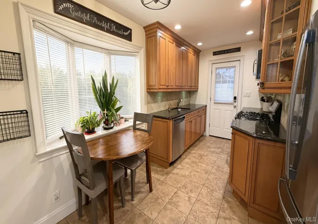 Photo 2 of Single family home for sale at 11 Lois Ln, Oyster Bay, NY 11735 | MLS# 1054937 | Listing updated on 2026-10-04