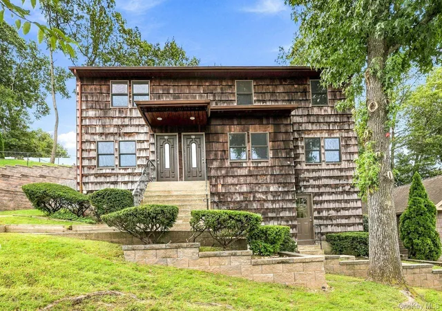 Photo 2 of Multi family home for sale at 22 24 Conifer Ct, Huntington, NY 11768 | MLS# 1054956 | Listing updated on 2026-10-04
