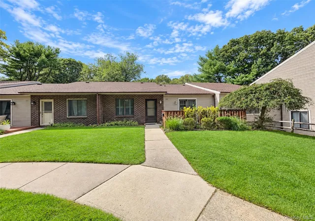 Photo 1 of Condo for sale at 810 Woodland Ct, Brookhaven, NY 11727 | MLS# 1055101 | Listing updated on 2026-09-29