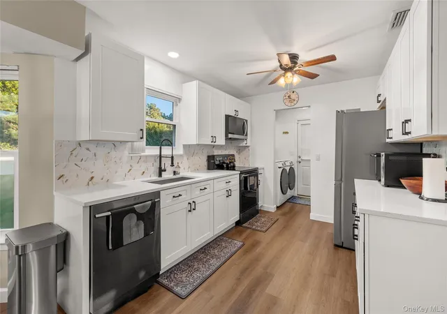 Photo 3 of Single family home for sale at 23 Blueberry Ln, Brookhaven, NY 11772 | MLS# 1055183 | Listing updated on 2026-10-07