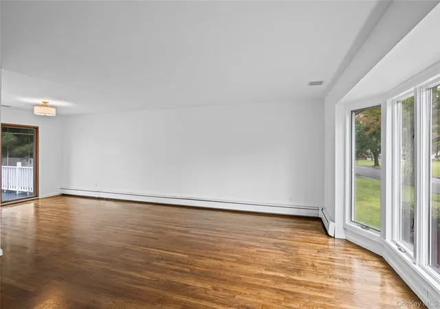 Photo 4 of Single family home for sale at 27 Schoenfield Ln, Huntington, NY 11747 | MLS# 1055388 | Listing updated on 2026-10-01