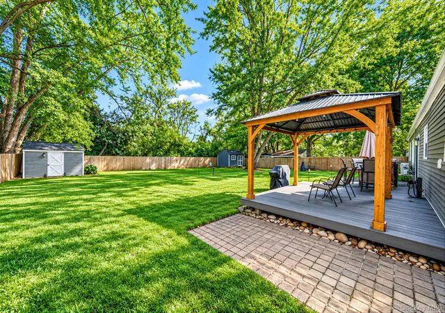 Photo 3 of Single family home for sale at 105 Raynor Rd, Brookhaven, NY 11961 | MLS# 1055507 | Listing updated on 2026-10-08