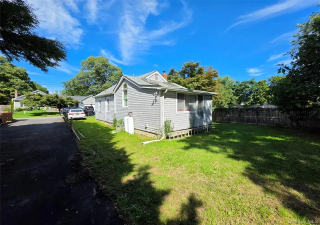 Photo 3 of Single family home for sale at 34 Flamingo Rd, Brookhaven, NY 11778 | MLS# 1055581 | Listing updated on 2026-10-10
