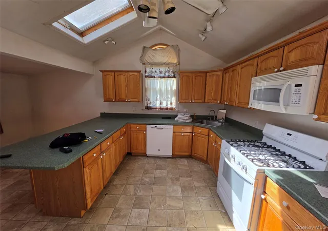 Photo 3 of Single family home for sale at 34 Flamingo Rd, Brookhaven, NY 11778 | MLS# 1055581 | Listing updated on 2026-10-10