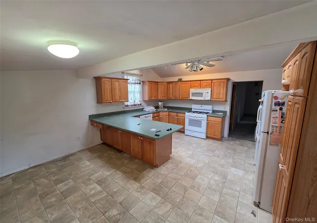 Photo 4 of Single family home for sale at 34 Flamingo Rd, Brookhaven, NY 11778 | MLS# 1055581 | Listing updated on 2026-10-10