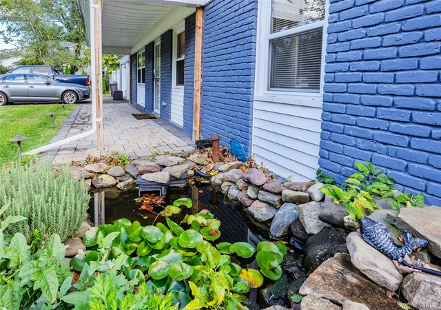 Photo 2 of Single family home for sale at 23 Wedgewood Dr, Brookhaven, NY 11727 | MLS# 1055596 | Listing updated on 2026-10-06