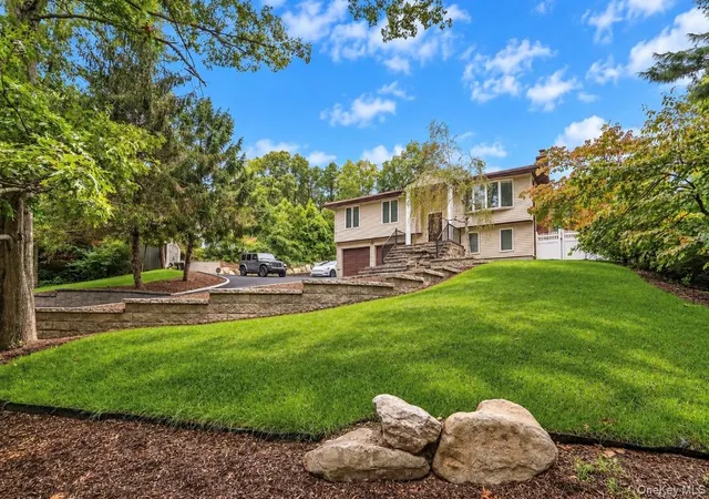 Photo 2 of Single family home for sale at 47 Mcarthur Ln, Smithtown, NY 11787 | MLS# 1055810 | Listing updated on 2026-09-29