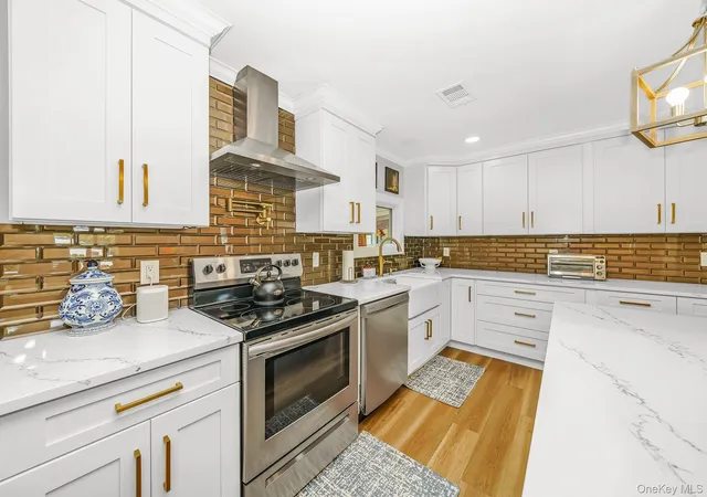 Photo 3 of Single family home for sale at 102 Inverness Rd, Islip, NY 11741 | MLS# 1055881 | Listing updated on 2026-10-01
