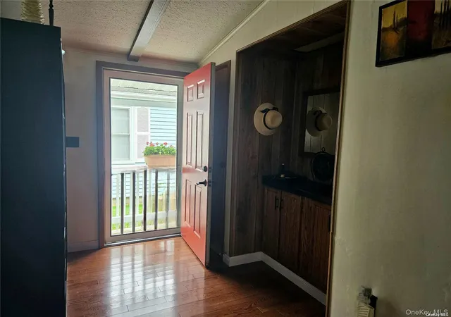 Photo 3 of Condo for sale at 124 Village Cir W #124, Brookhaven, NY 11949 | MLS# 1056096 | Listing updated on 2026-09-29