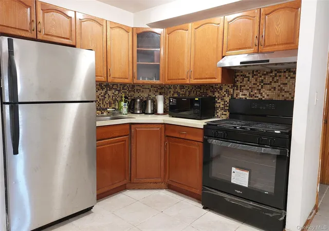 Listing Photo 1 - Condo for sale in building located at 102-14 Lewis Ave, New York, NY 11368 - Unit #2D