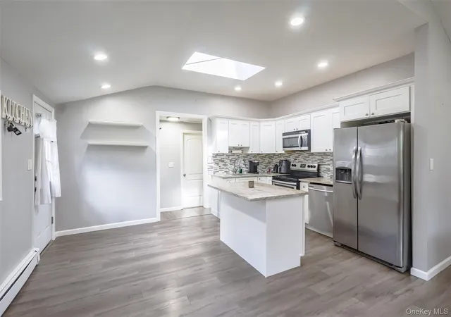 Photo 3 of Single family home for sale at 3 Elmwood Ave, Brookhaven, NY 11784 | MLS# 1056171 | Listing updated on 2026-10-06