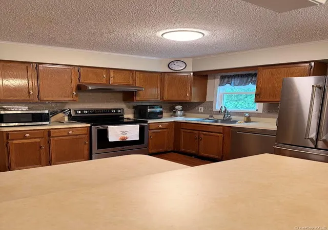 Photo 1 of Single family home for sale at 9 Fowler Ave, Brookhaven, NY 11779 | MLS# 1056183 | Listing updated on 2026-09-30