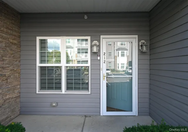 Photo 2 of Condo for sale at 212 Clubhouse Cir #212, Huntington, NY 11747 | MLS# 1056360 | Listing updated on 2026-10-07
