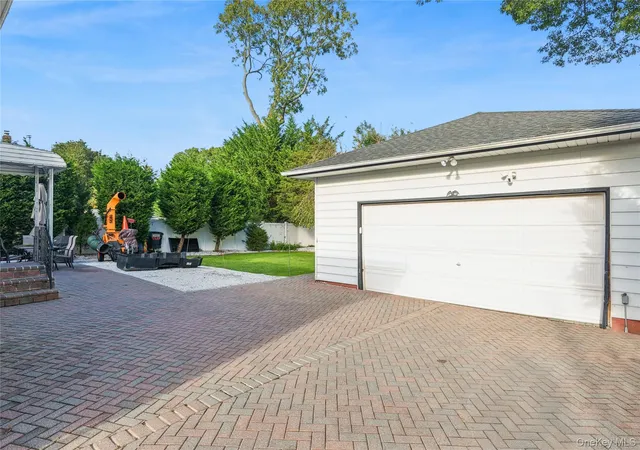 Photo 3 of Single family home for sale at 15 Pine Cone St, Brookhaven, NY 11953 | MLS# 1056461 | Listing updated on 2026-10-02