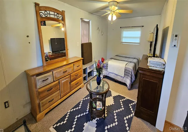Photo 3 of Manufactured home for sale at 703 Fresh Pond Ave #101, Riverhead, NY 11933 | MLS# 1056747 | Listing updated on 2026-09-30