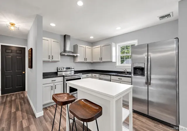Photo 3 of Single family home for sale at 22 Logan Pl, Brookhaven, NY 11950 | MLS# 1056844 | Listing updated on 2026-10-03