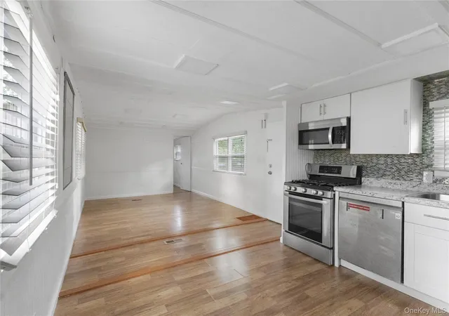 Photo 2 of Manufactured home for sale at 525 Riverleigh Ave #35, Riverhead, NY 11901 | MLS# 1056845 | Listing updated on 2026-10-06