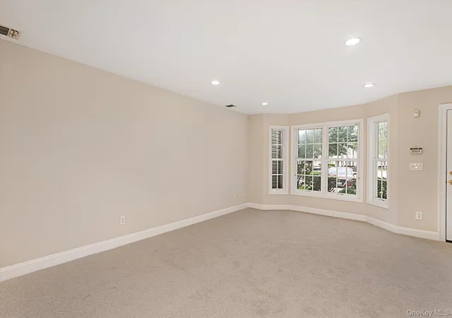 Photo 3 of Condo for sale at 991 Madeira Blvd, Huntington, NY 11747 | MLS# 1056900 | Listing updated on 2026-10-01