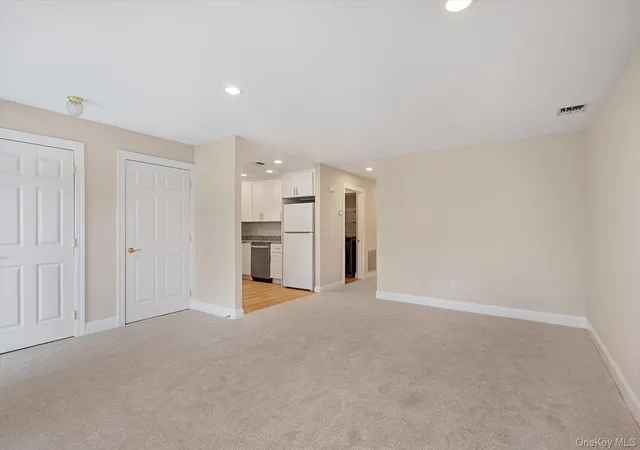 Photo 3 of Condo for sale at 991 Madeira Blvd, Huntington, NY 11747 | MLS# 1056900 | Listing updated on 2026-10-01