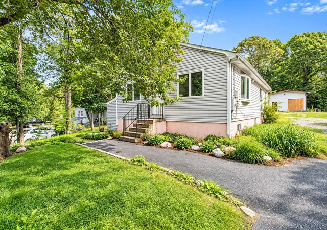 Photo 1 of Single family home for sale at 95 W Bartlett Rd, Brookhaven, NY 11953 | MLS# 1056935 | Listing updated on 2026-10-08