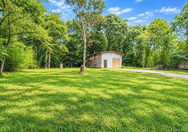 Photo 4 of Single family home for sale at 95 W Bartlett Rd, Brookhaven, NY 11953 | MLS# 1056935 | Listing updated on 2026-10-08